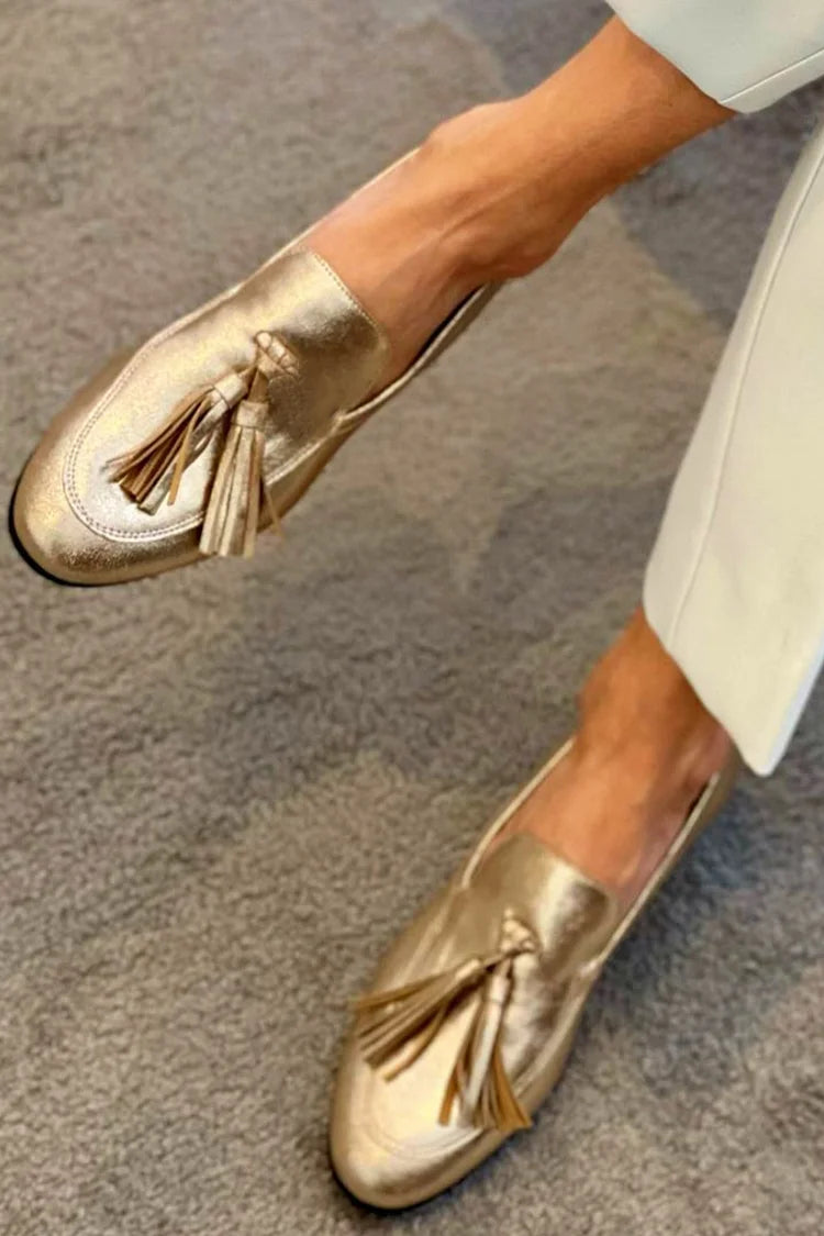 Zimena - Goldene Loafer mit metallischem Glanz und Fransen