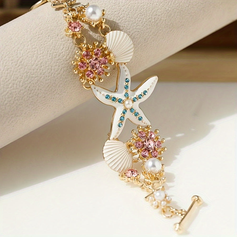 Wunderschönes Armband mit Seestern-Anhänger, Muscheldetails und Meerkorallen-Perlen