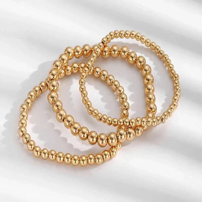 7-teiliges Goldenes Perlenarmband-Stapelset