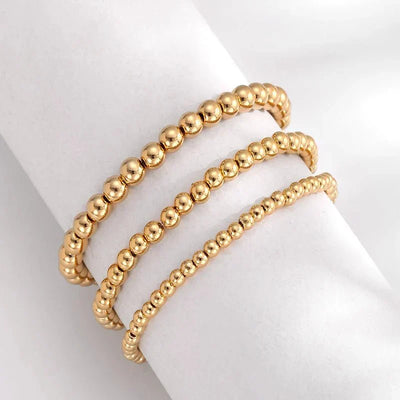 7-teiliges Goldenes Perlenarmband-Stapelset