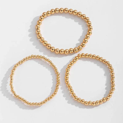 7-teiliges Goldenes Perlenarmband-Stapelset