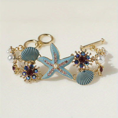 Wunderschönes Armband mit Seestern-Anhänger, Muscheldetails und Meerkorallen-Perlen